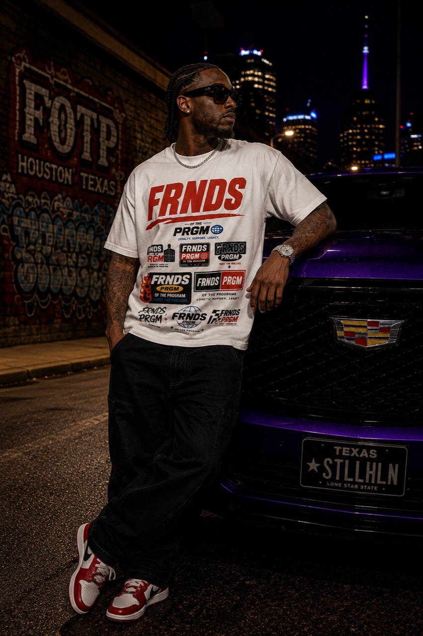 Model leaning on a purple Cadillac while wearing the white FRNDS PRGM tee at night