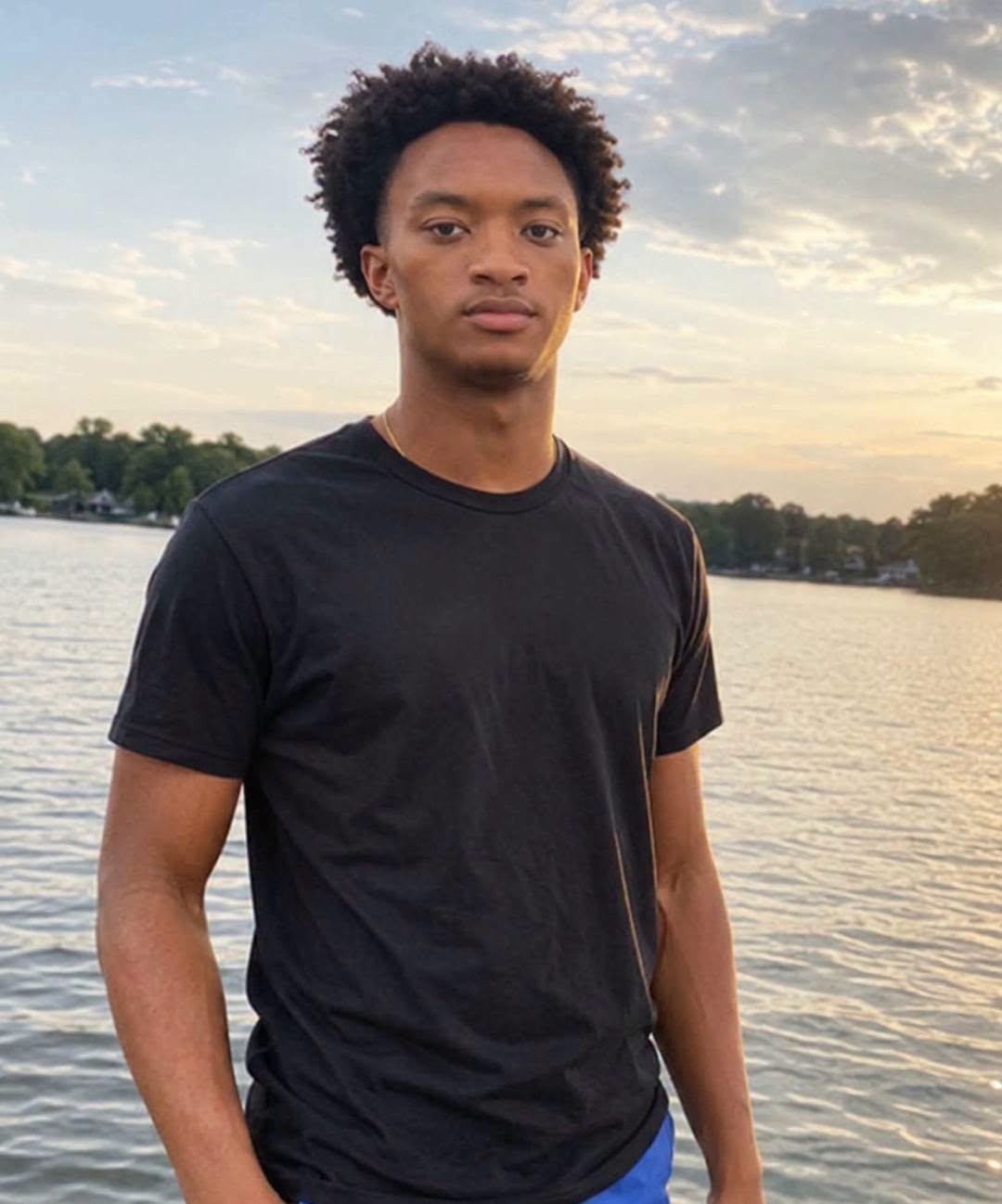Nolan Wells standing by the water